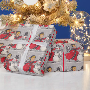 Weihnachtsschneemann tanzt mit Mädchen im Vintage- Geschenkpapier