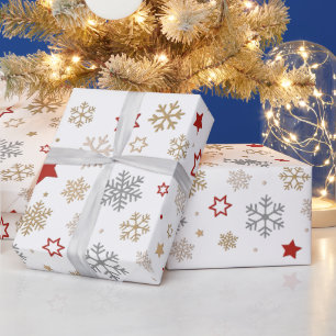 Weihnachtsstern-und -schneeflocke-Muster Geschenkpapier