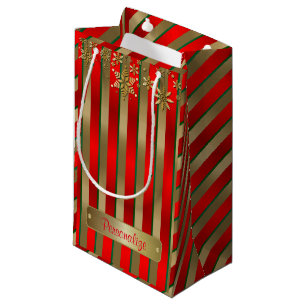 Weihnachtsstreifen im Gold, im Rot und im Grün Kleine Geschenktüte