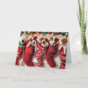 Weihnachtswelpen in Strümpfen Feiertagskarte