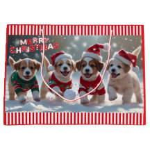 Weihnachtswelpen in Sweatshirts spielen im Schnee