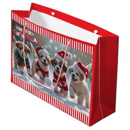 Weihnachtswelpen in Sweatshirts spielen im Schnee Große Geschenktüte