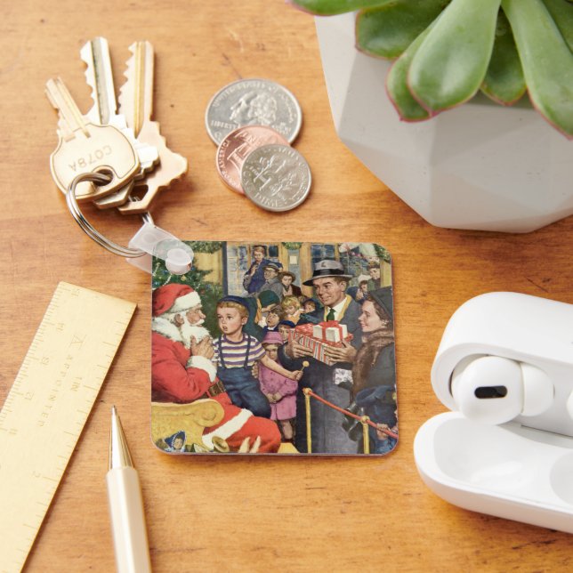 Weihnachtswunsch, Junge auf Weihnachtsmann Schlüsselanhänger (Schreibtisch)