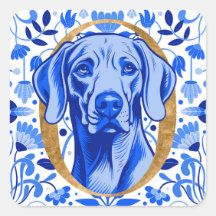 Weimaraner, der durch den Buchstaben "O" in Gold s