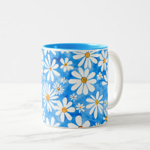 Weiß bläst auf blauem Hintergrund. Handgezeichnete Zweifarbige Tasse