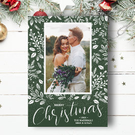 Weiß frohe Weihnachten auf grünem Foto