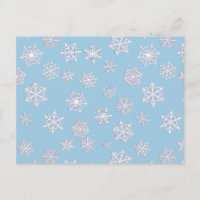 Weiße 3-D-Schneeflocken auf eisblauem Hintergrund