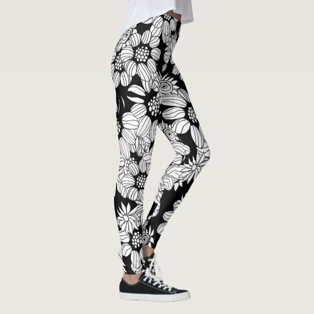 Weiße Blumen auf einem schwarzen Hintergrund Leggings (Rechts)