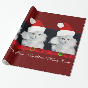 WEISSE CHRISTMAS CAT,SANTA CLAUS HAT UND ROTES RIB GESCHENKPAPIER