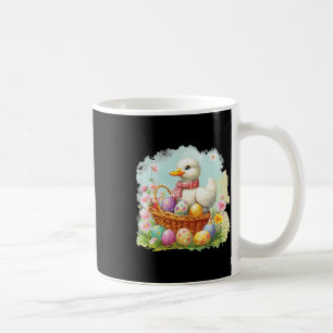 Weiße Ente auf einem Bysket voller Ostereier; Oste Kaffeetasse