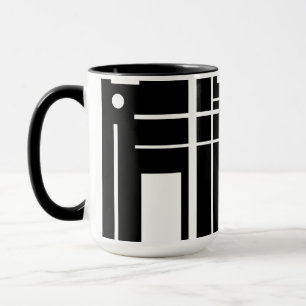 Weiße geometrische Formen auf der schwarzen Tasse