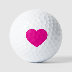 Weiße Golfbälle mit rosa Herz – Romantischer Sport