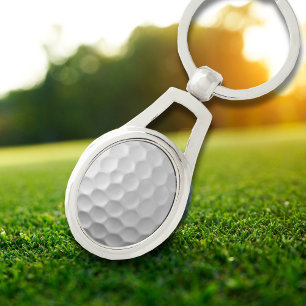 Weiße golfballstruktur mit dimpeln schlüsselanhänger