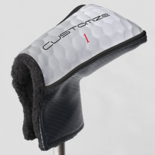 Weiße golfkugel mit strukturierter oberfläche und  golf headcover