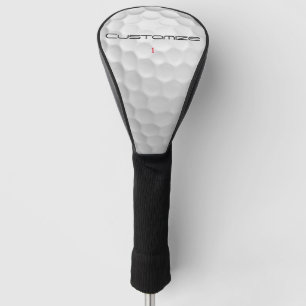 Weiße golfkugel mit strukturierter oberfläche und  golf headcover