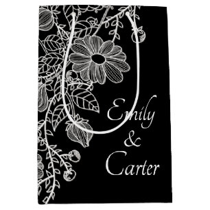 Weiße Hochzeitsstrecke auf schwarz Mittlere Geschenktüte