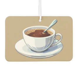 Weiße Kaffeetasse auf einem Unterteller gefüllt mi Autolufterfrischer
