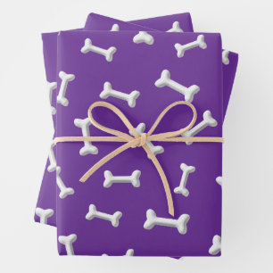 Weiße Knochen auf violettem Hintergrund, individue Geschenkpapier Set