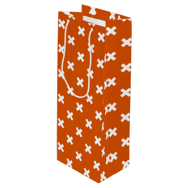 Weiße Kreuzstiche auf verbranntem Orange Geschenktüte Für Weinflaschen (Vorderseite Schrägansicht)