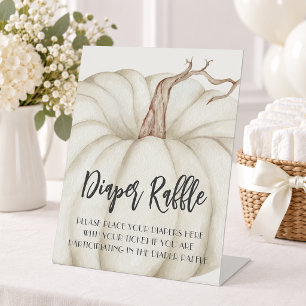 Weiße Kürbis-Baby-Shower-Windel-Raffel Sockelschild
