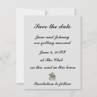 Weiße Magnolische Blume auf einer Save the Date Ka