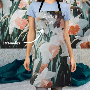 Weiße Orangendärme im Frühlingsgarten Schürze