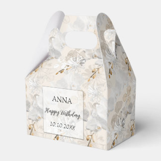 Weiße Orchideen auf einer hellen Creme Geschenkschachtel