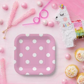 Weiße Polka auf Rosa Pappteller