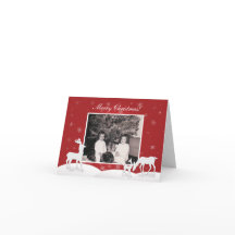 Weiße Rentierkarte und Schneeflocken