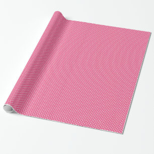 Weiße Schädel auf rosa Packpapier