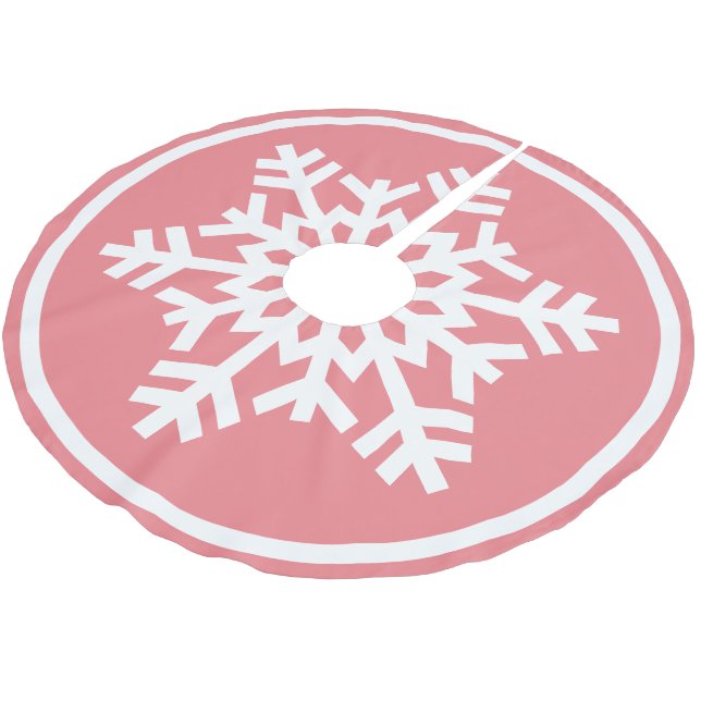 Weiße Schneeflocke auf hellrosa Korallenrosa Polyester Weihnachtsbaumdecke (Schrägansicht)