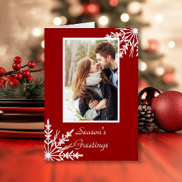 Weiße Schneeflocken auf den Grüßen der Roten Jahre