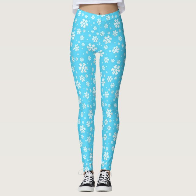 Weiße Schneeflocken auf Hellblauem Winter Muster Leggings (Vorderseite)