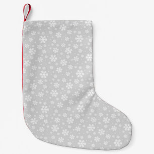 Weiße Schneeflocken auf silbernem Wintermuster Kleiner Weihnachtsstrumpf