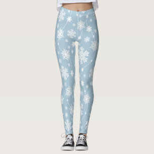 Weiße Schneeflocken im hellblauen Hintergrund Wint Leggings