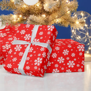 Weiße Schneeflocken im roten Wintermuster Geschenkpapier