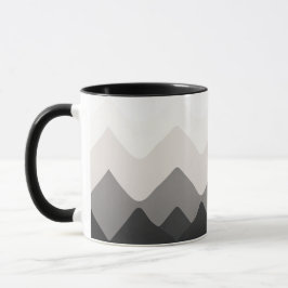 Weiße, schwarze und graue Tasse