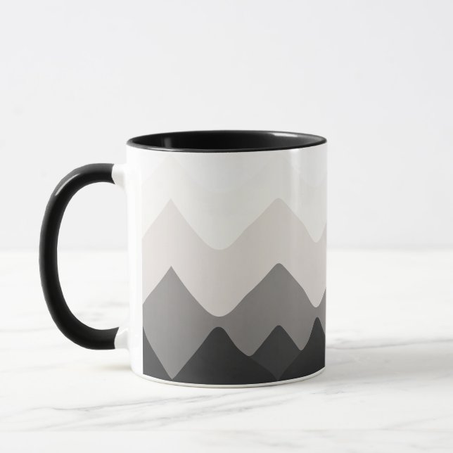 Weiße, schwarze und graue Tasse (Links)
