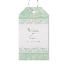 Weiße Spitze auf grünen Gastgeschenk Hochzeiten