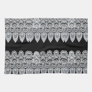 Weiße Spitze bildet eine empfindliche Grenze gegen Geschirrtuch