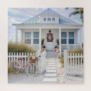 Weiße Strandhütte mit rosa Kürbissen und Fahrrad Puzzle