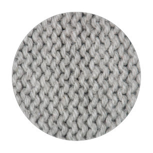 Weiße Strickwollestruktur, nahes Foto. Schneidebrett