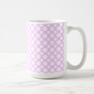 Weiße Tupfen auf rosa Kaffeetasse