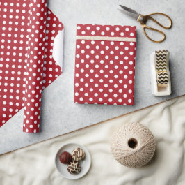 Weiße Tupfen auf rotem Geschenkpapier
