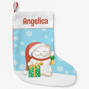 Weiße Weihnachtskatze in einem Red Hat Kleiner Weihnachtsstrumpf