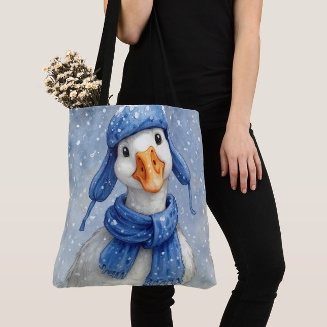 Weiße Wintergans mit blauem Schal (Von Nahem)