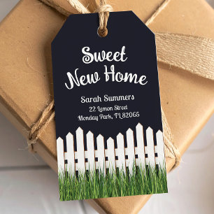 Weiße Zaun-Ankündigung der neuen Adresse Geschenkanhänger