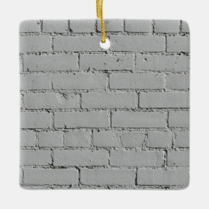 Weiße Ziegelmauer Keramikornament
