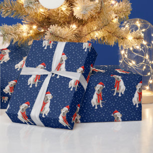 Weißer gelber Labrador Retriever in Santa-Mütze Geschenkpapier