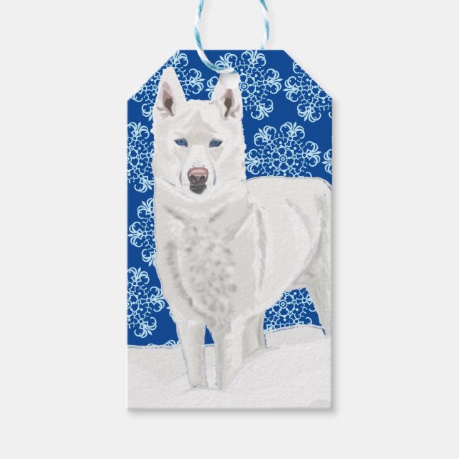 Weißer Husky gegen Schneeflocken und dunkelblauer  Geschenkanhänger (Vorderseite)